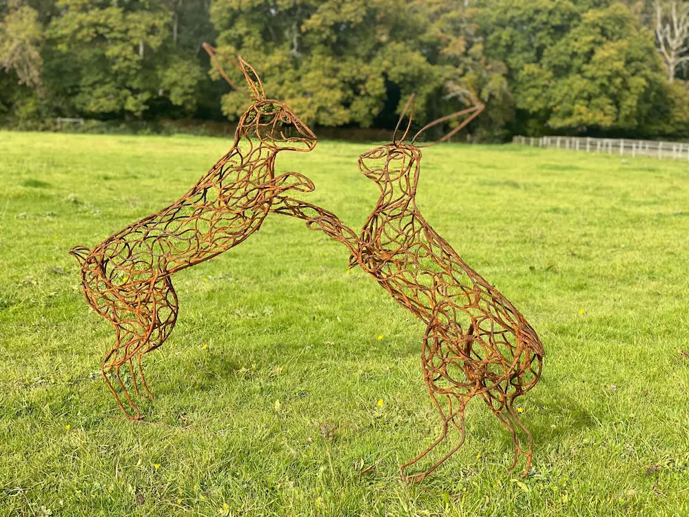 Boxing hares sculpture