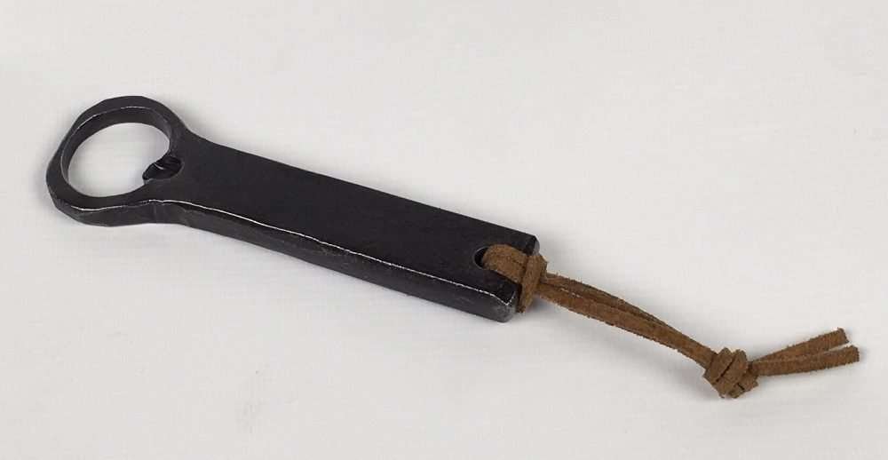 black bottle opener with brown material