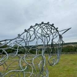 side view of half horse sculpture