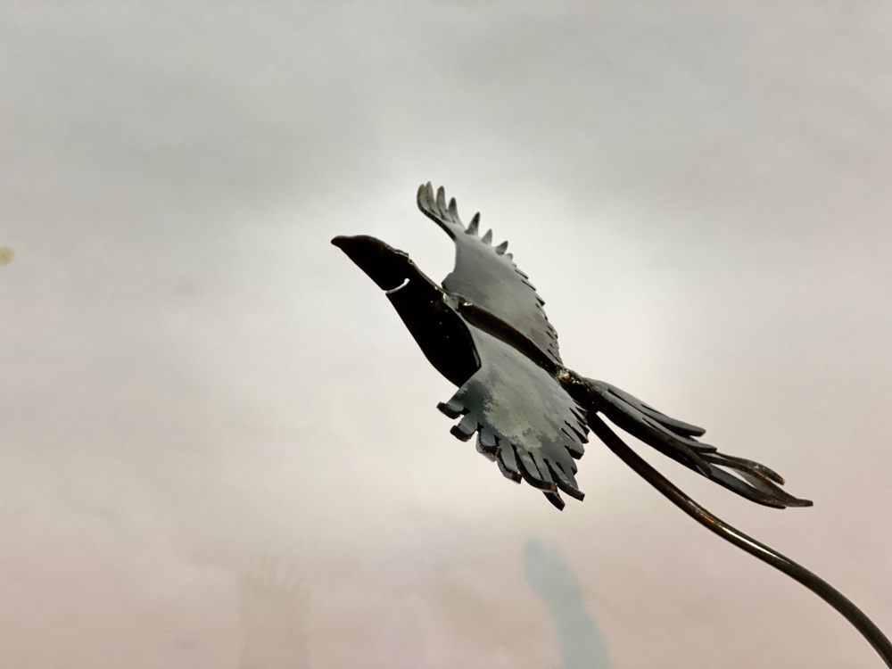 One Black Bird Flying Sculpture