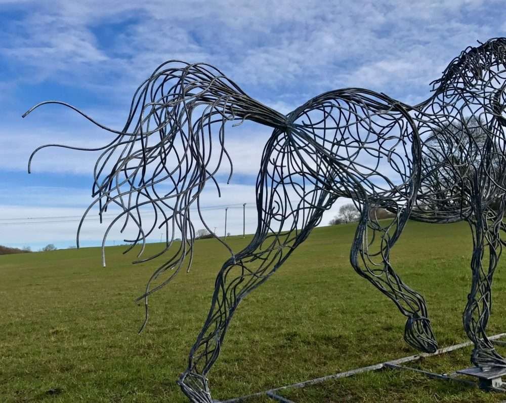 Tail Of Black Horse Trotting Sculpture