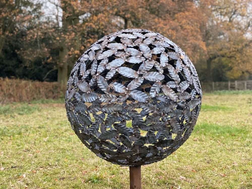 Beech Leaf Sphere Sculpture In A Field