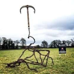 Gravity Anchor Sculpture Next To Elliott Of London Sign