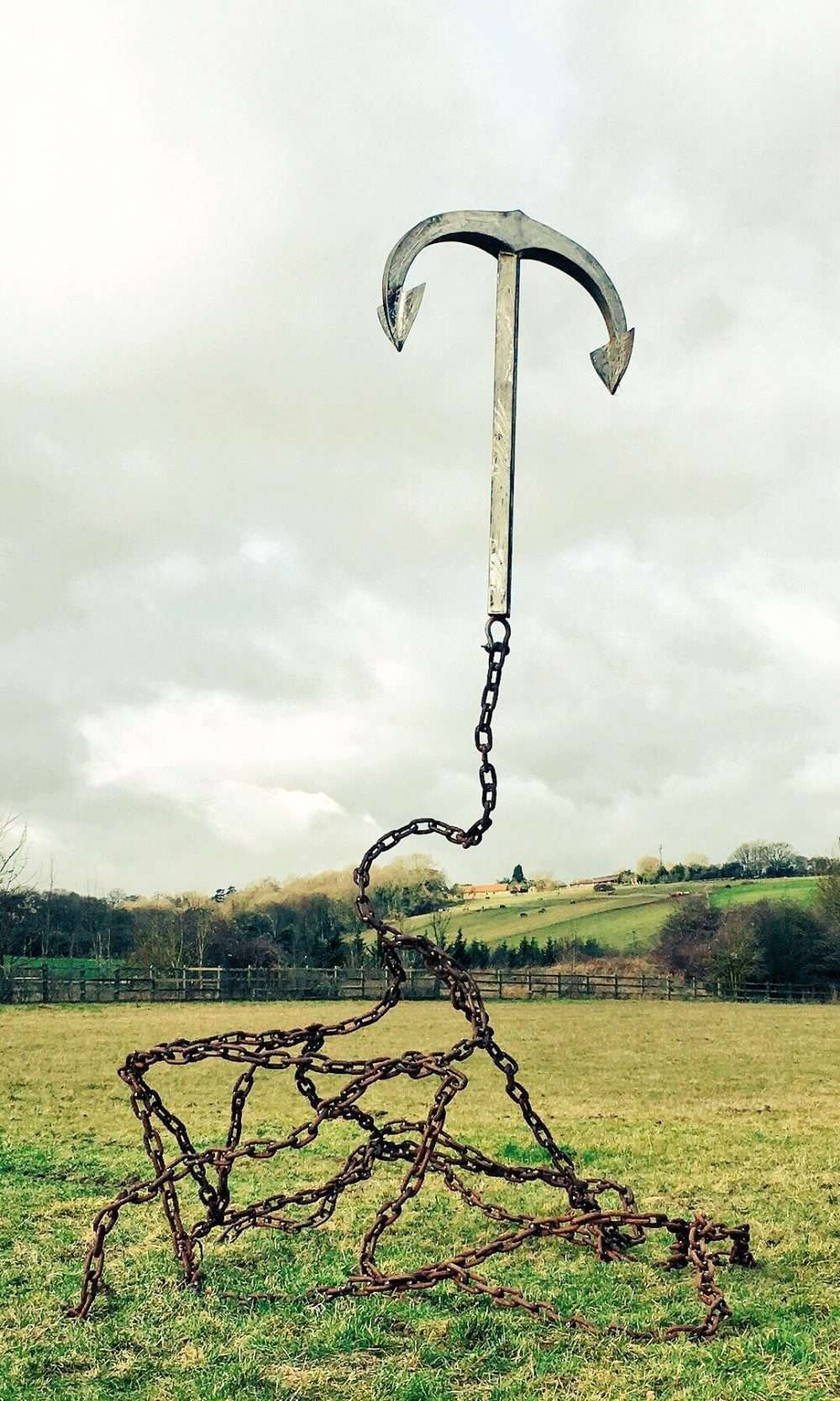 Gravity Anchor Sculpture In A Field