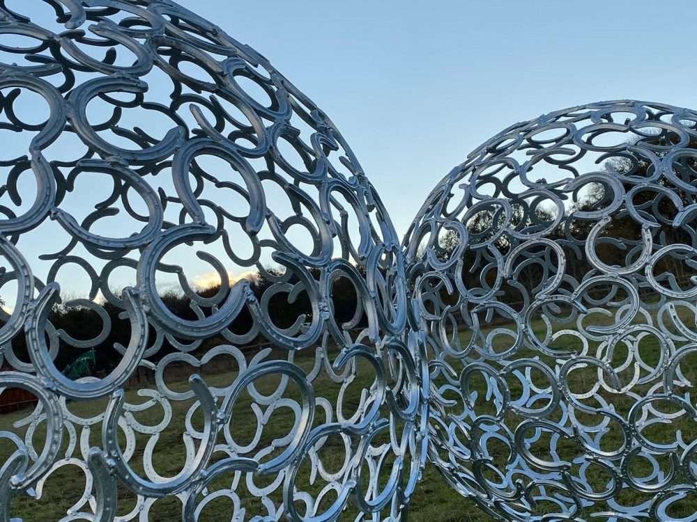 Two Horseshoe Sphere Sculptures