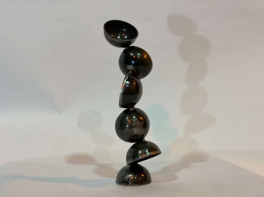 Black mirrored pearl sculpture