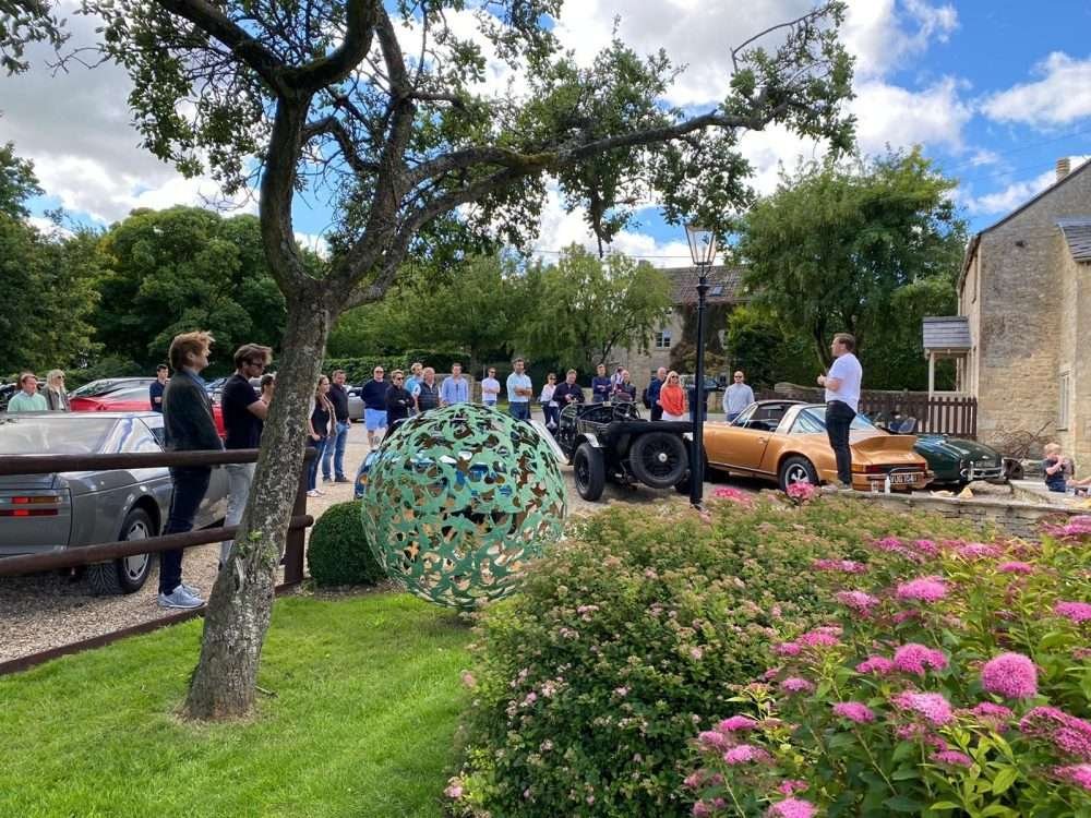 Swift Sphere Sculpture surrounded by spectators
