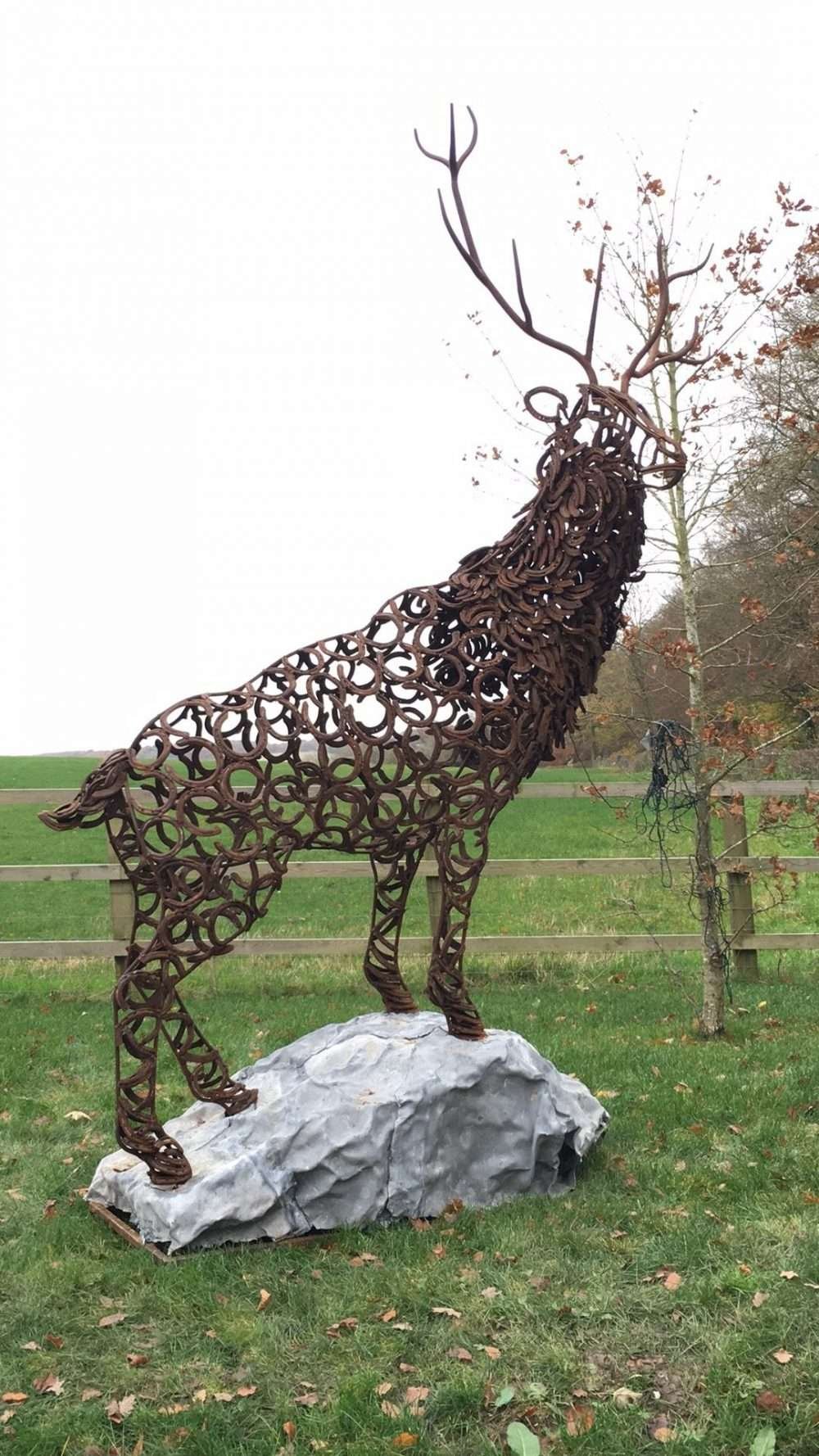 Stag Sculpture In Large Field
