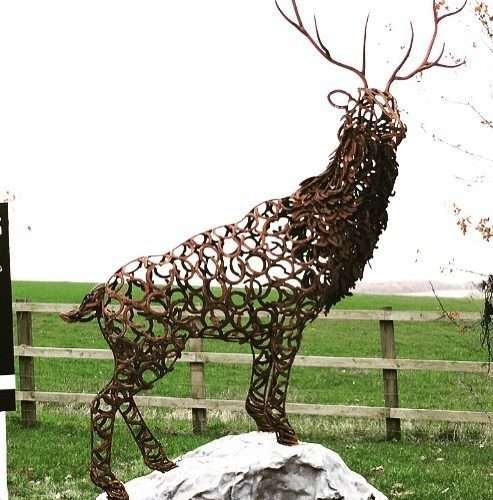 Bronzed Horseshoe Stag Sculpture In Large Field