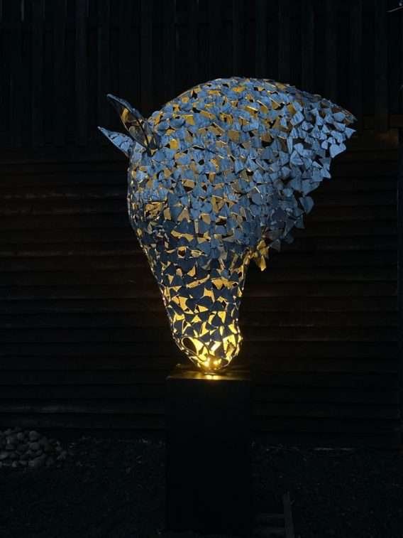 solver horse head sculpture with lights