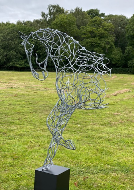 small silver horse sculpture