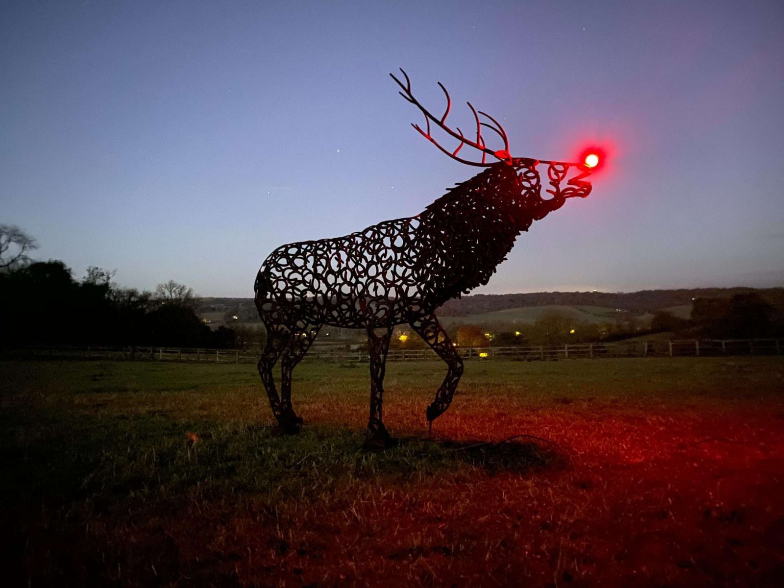 Bellowing Stag Sculpture With Red Light