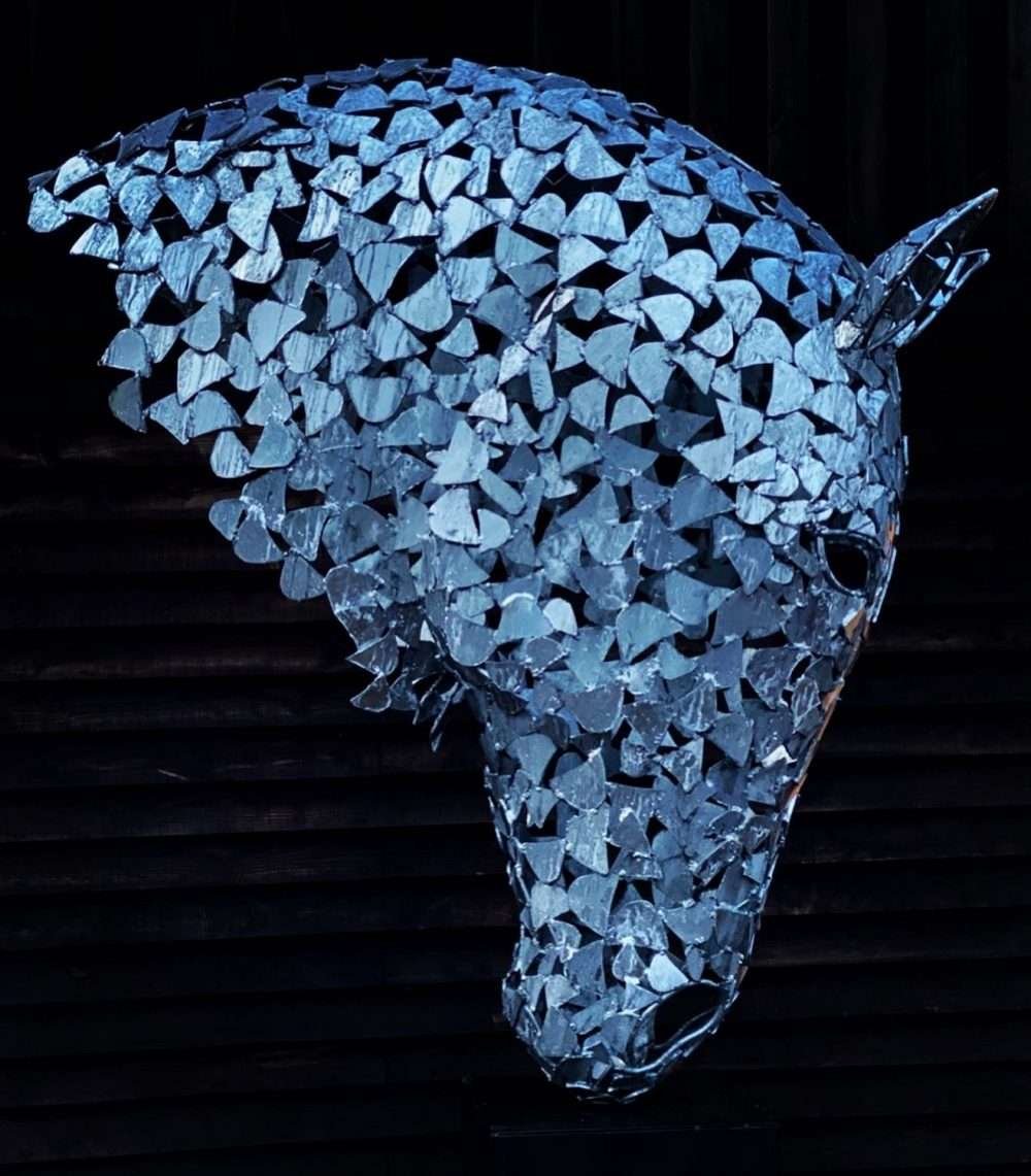 Silver Horse Head Against Dark Background