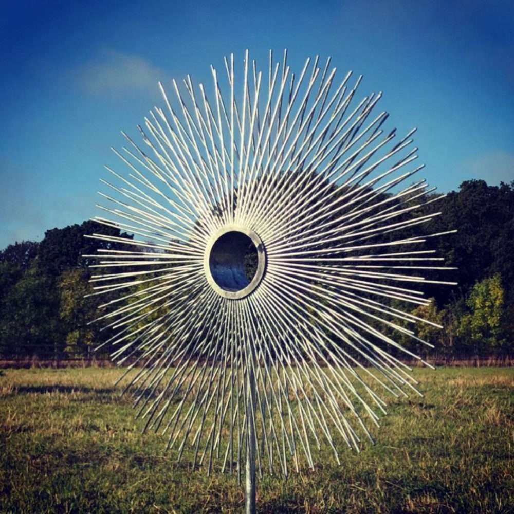 Circle Peacock Sculpture In A Field