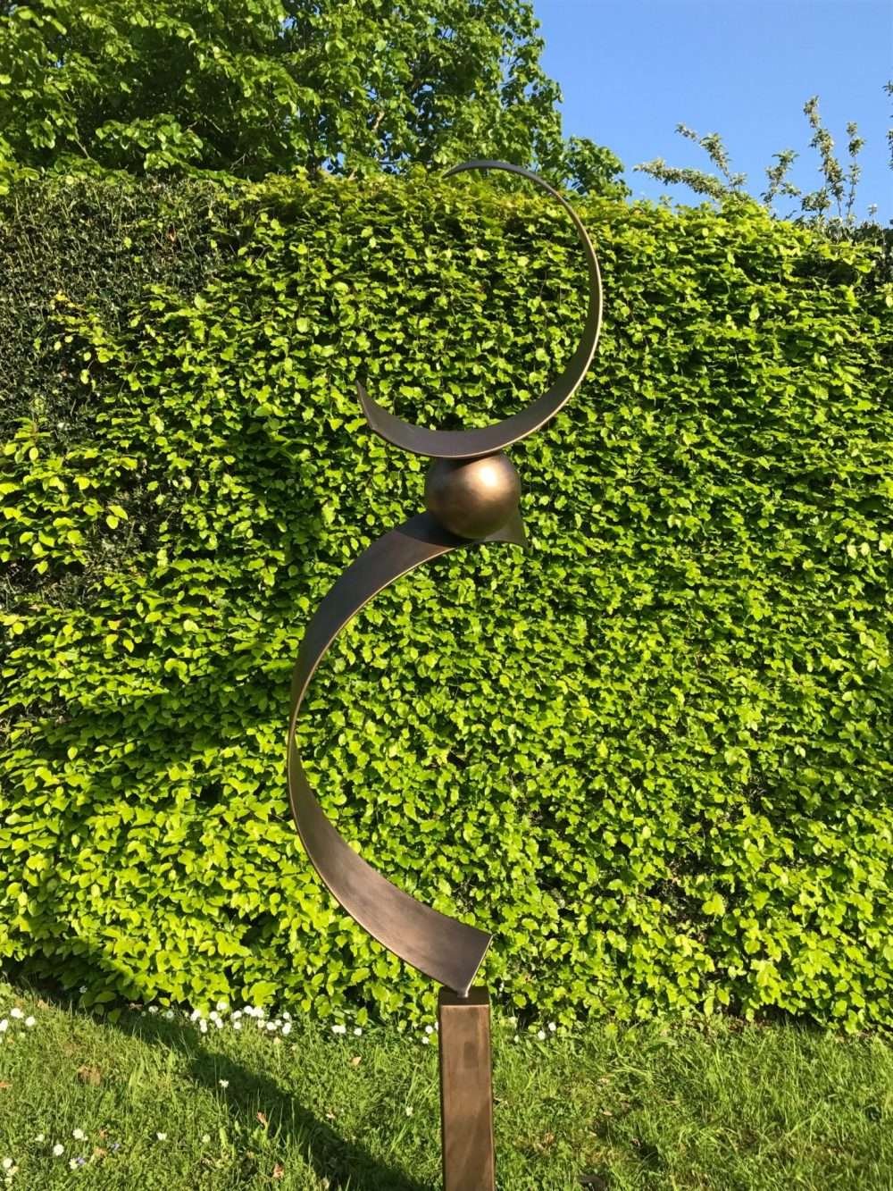 Abstract Brass Spiral Structure On A Sunny Day