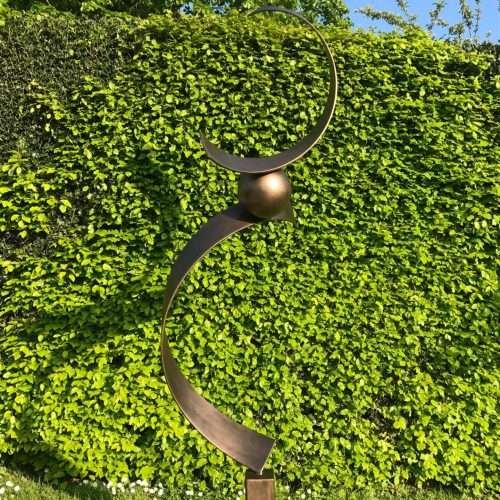 Abstract Brass Spiral Structure On A Sunny Day