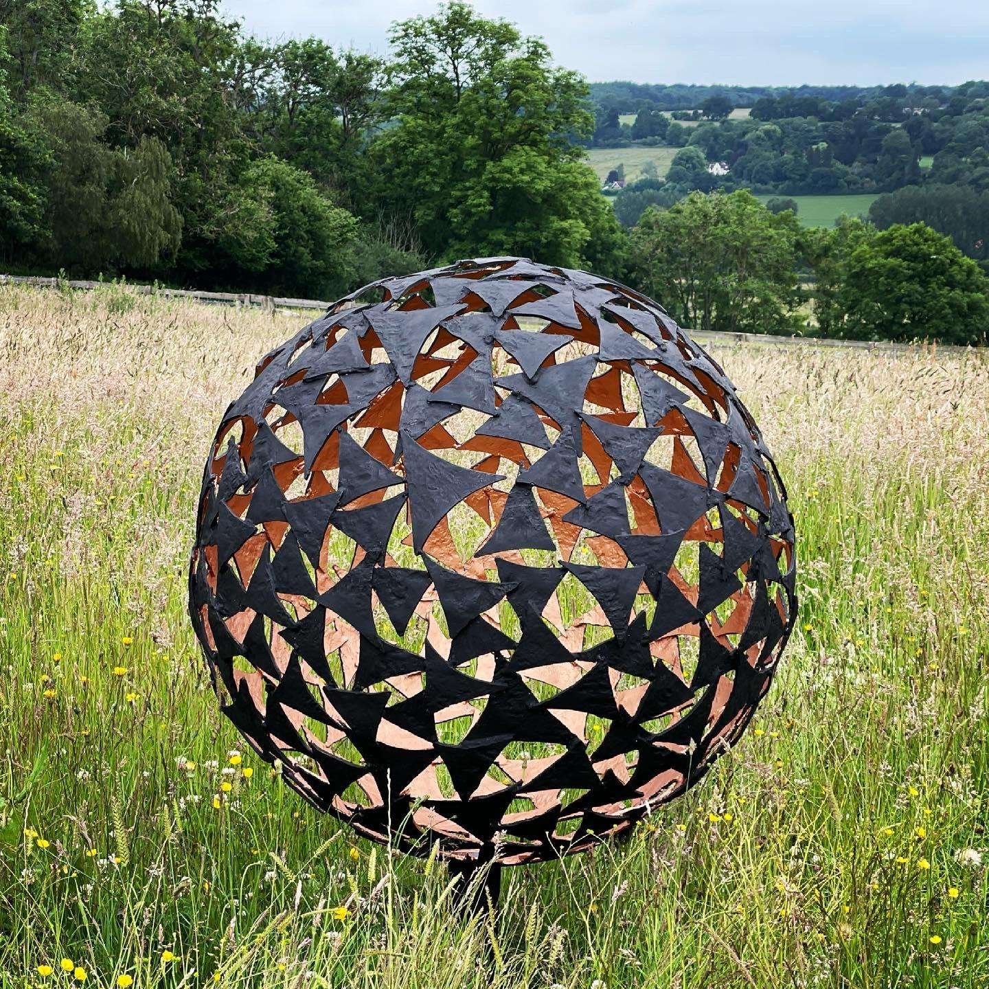 black sphere sculpture