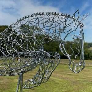 sculpture of jumping horse