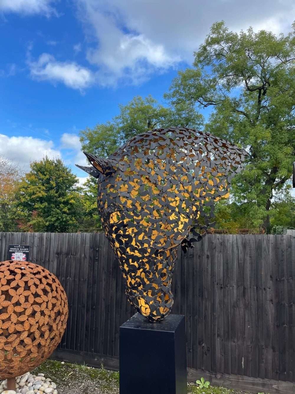 black and gold horse head sculpture