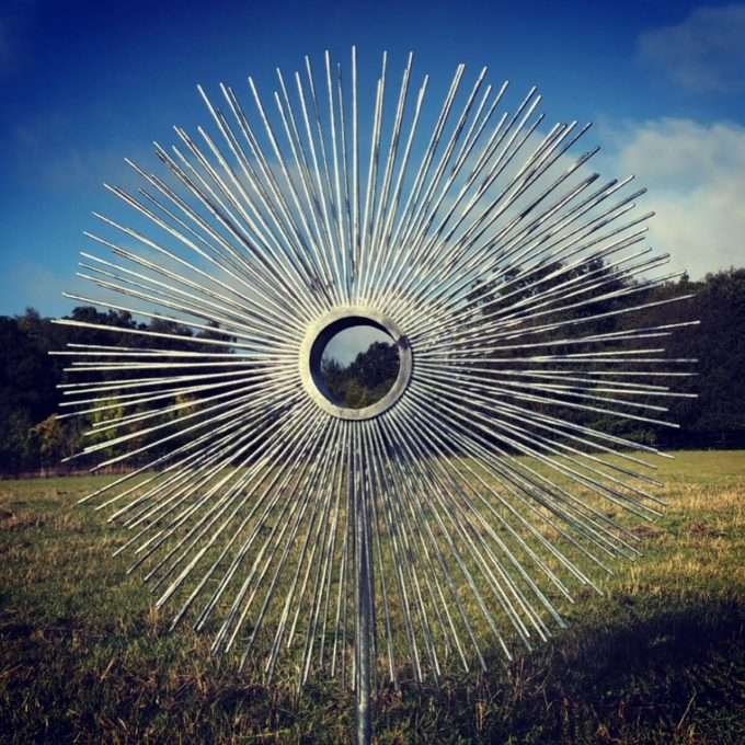 circular eye sculpture on a sunny day